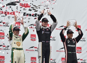 Luca Filippi, Joseph Newgarden and Helio Castroneves oin the podium at Toronto - Photo by Chris Jones for IndyCar.
